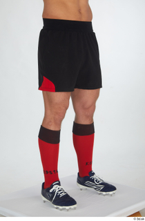 Erling black shorts red socks rugby boots rugby clothing sports…